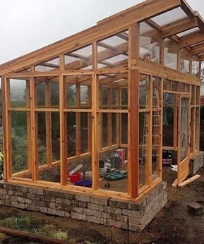 Glass greenhouse structure built from a plan